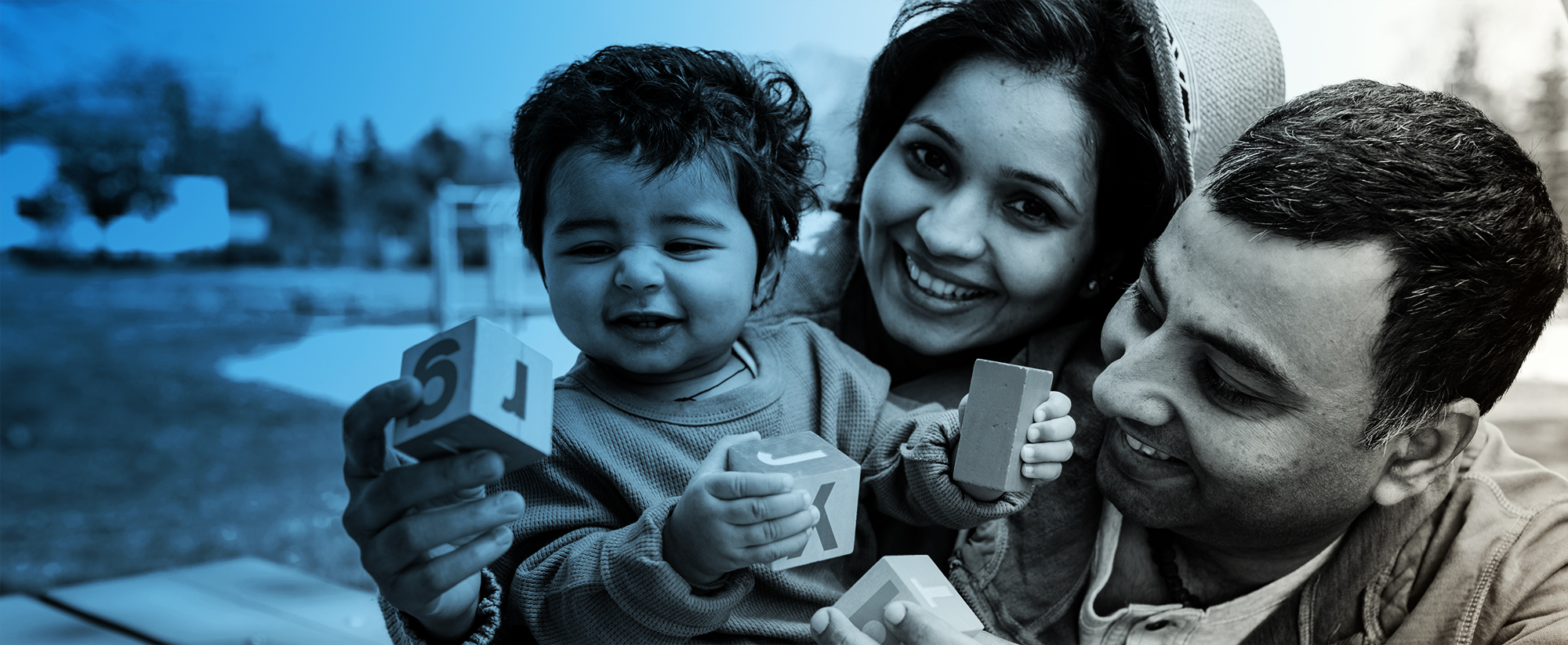 Smiling baby and happy parents